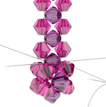 Beads being threaded together